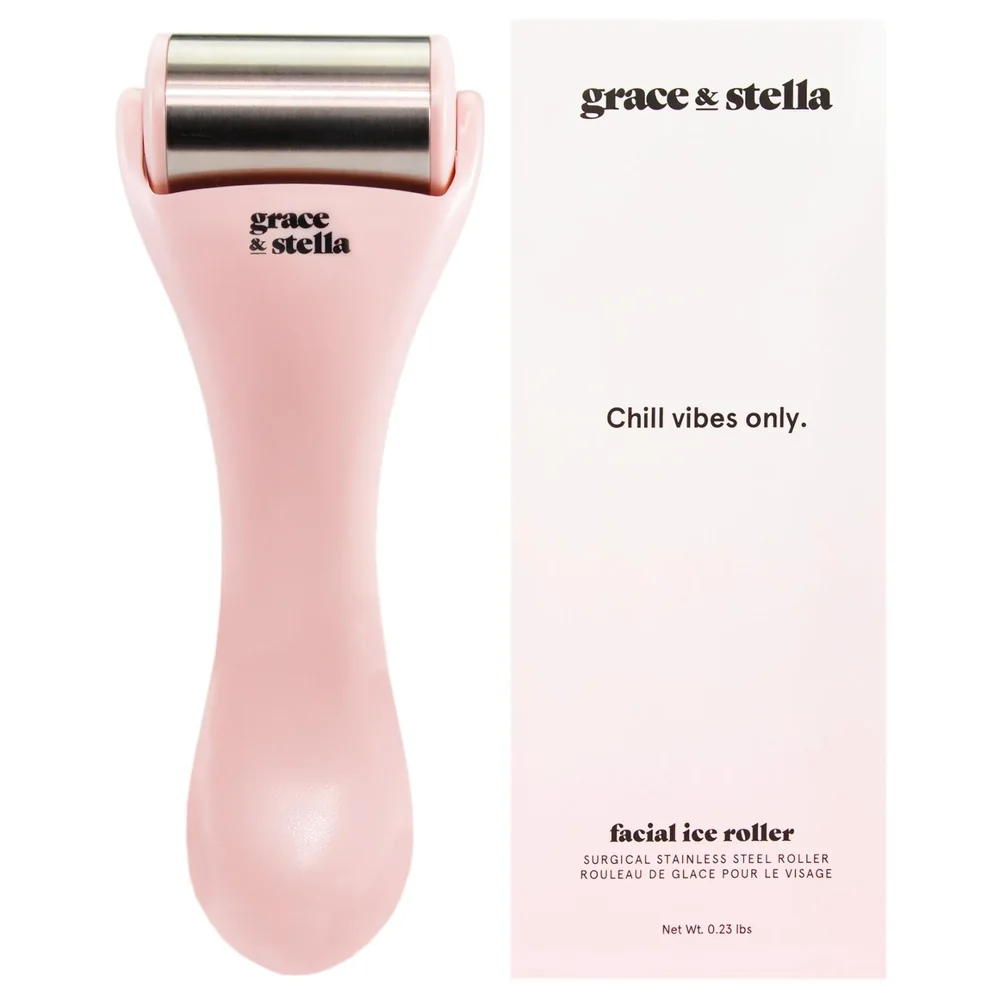 A pink facial ice roller with a stainless steel head, next to its box